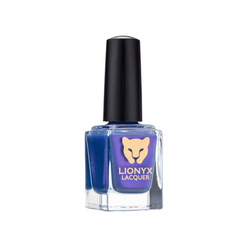 Close-up of BLURPLE REIGN by LIONYX Lacquer, a blurple nail polish with fuchsia shimmer.