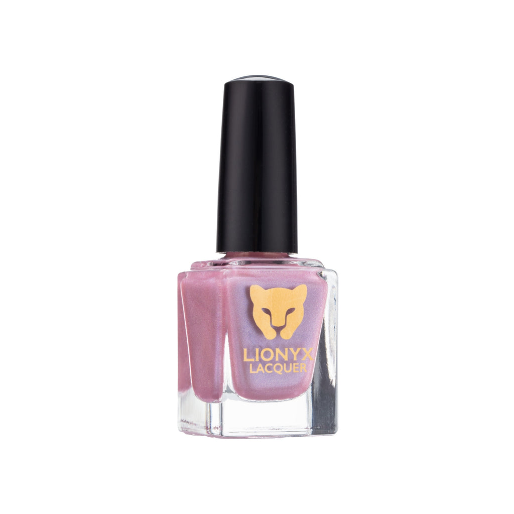 Close-up of JELLYFISH KISS by LIONYX Lacquer, a light pink jelly nail polish with holographic sparkle.