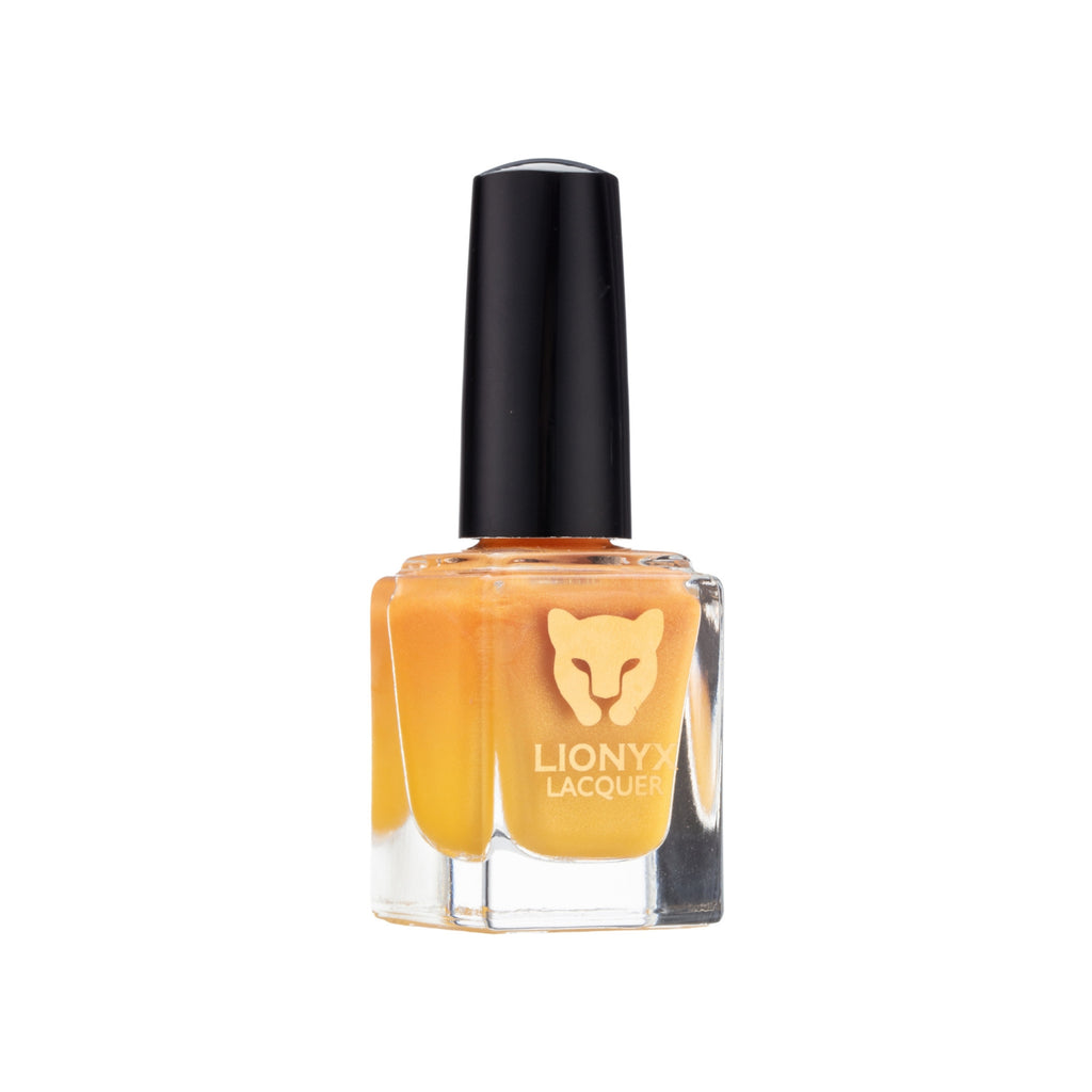 Close-up of PEACH DON'T KILL MY VIBE by LIONYX Lacquer, a peach thermal nail polish.